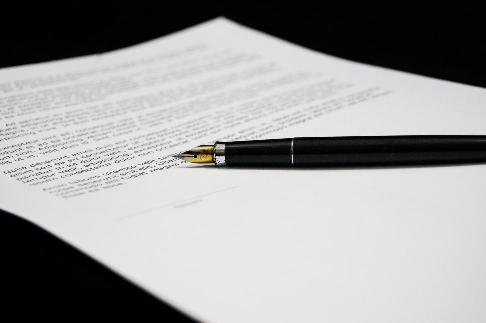 Free Image of Pen on Top of Paper 