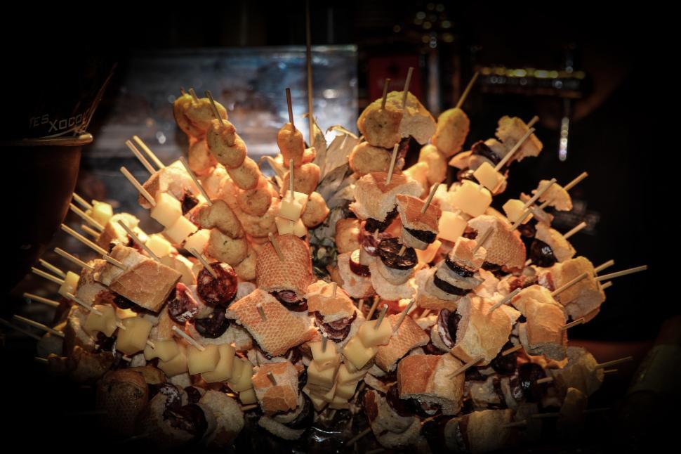 Free Image of Pile of Skewered Food on Table 