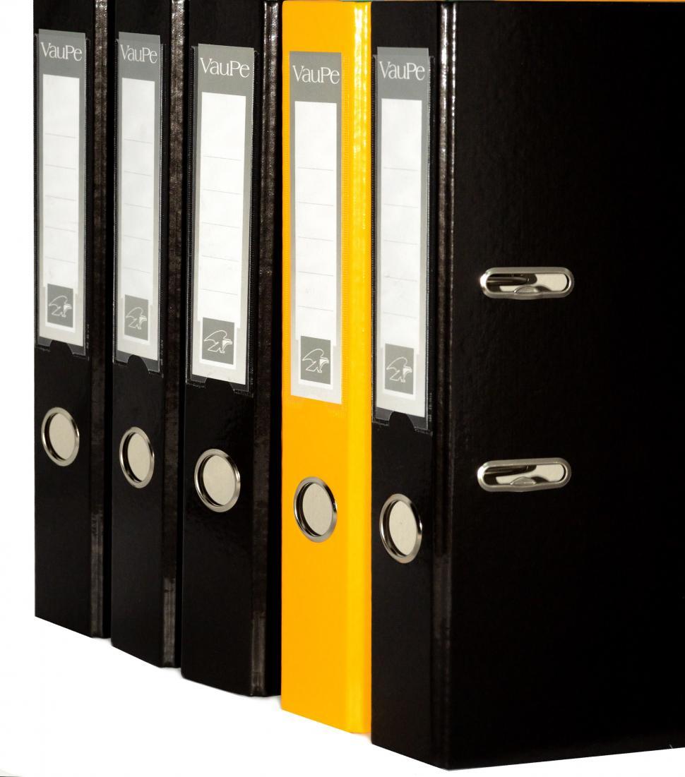 Free Image of Black Binder With Yellow Ring 