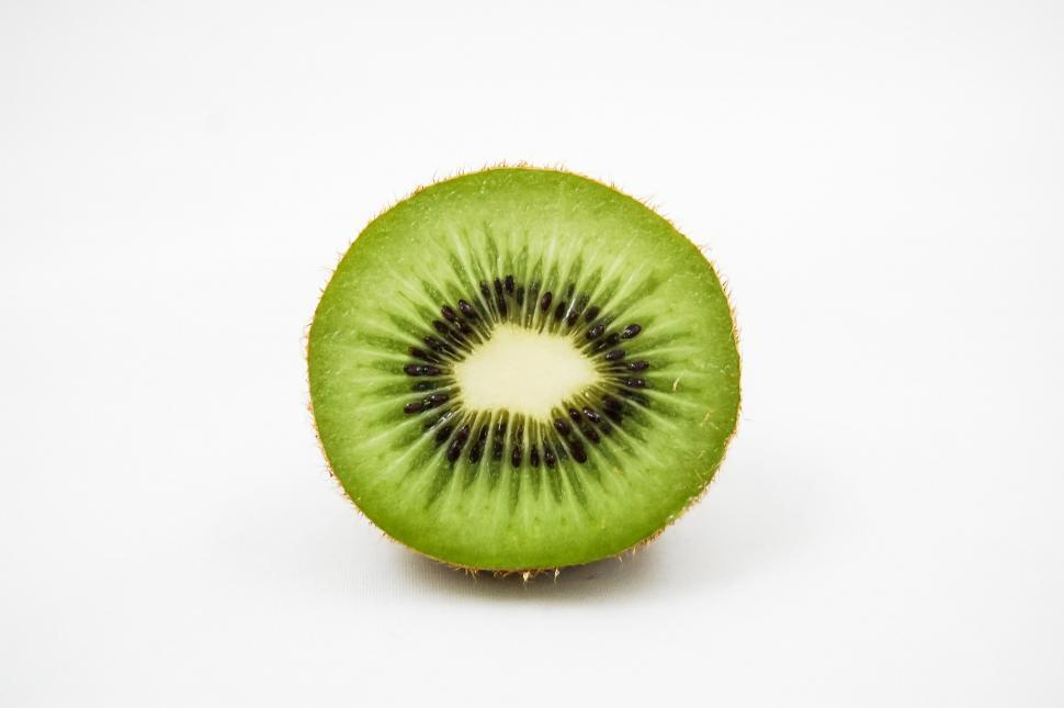 Free Image of Halved Kiwi on White Background 
