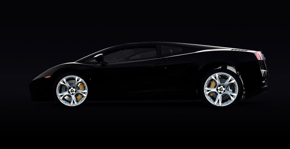 Free Image of Black Car Parked in the Dark 