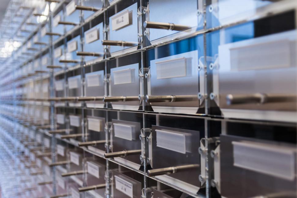 Free Image of Stacked Metal Boxes in Industrial Setting 