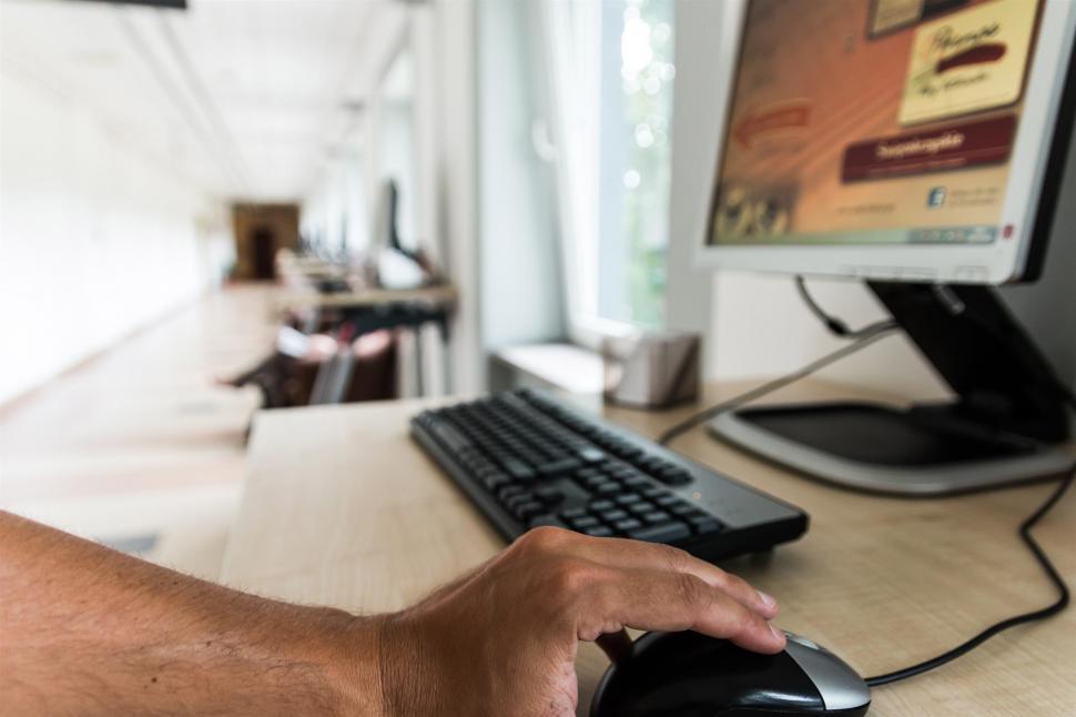 Free Image of Man Typing on Computer Keyboard 