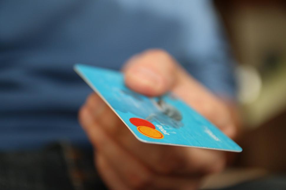 Free Image of Person Holding Credit Card in Hand 