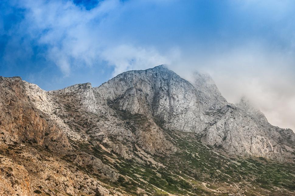 Free Image of Majestic Mountain Peak With Clouds 