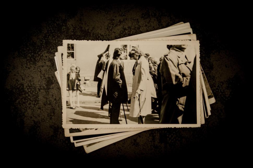 Free Image of Group of People Walking Down Street Together 