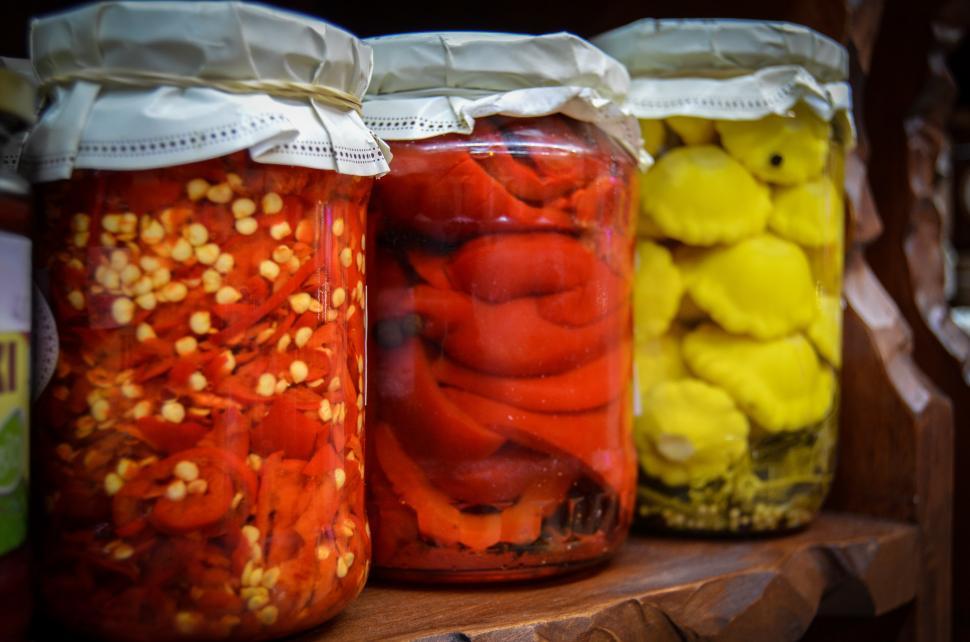 Free Image of Row of Jars Filled With Different Types of Food 