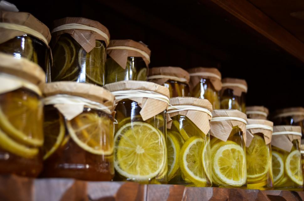 Free Image of Shelf Filled With Jars of Lemons 