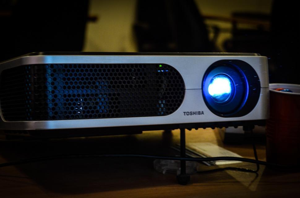 Free Image of Projector on Wooden Table 