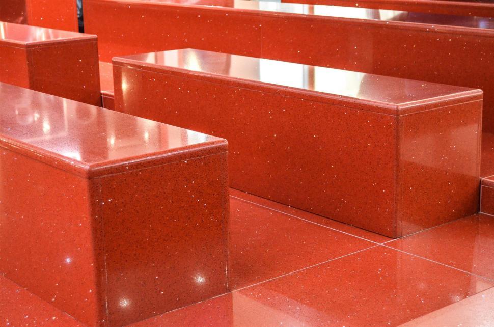 Free Image of Row of Red Benches in a Park 