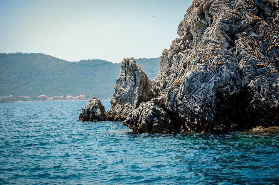 Free Image of Rock Outcropping in Middle of Water 