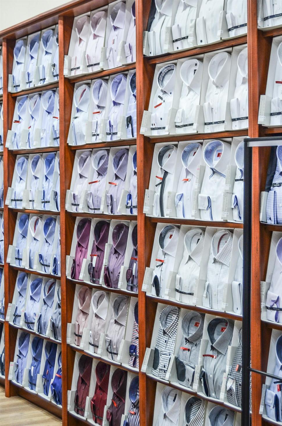 Free Image of Wall of Shirts and Ties in Store 