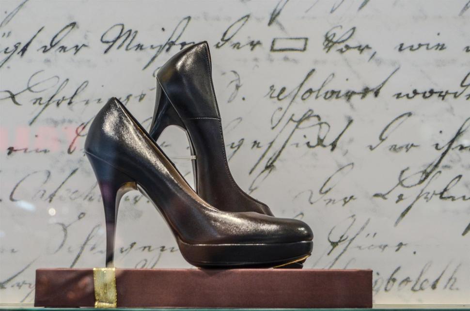 Free Image of Pair of Black High Heels on Table 
