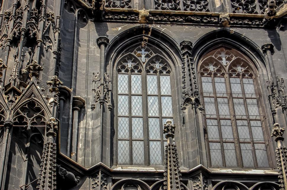 Free Image of Large Building With Many Windows and a Clock 
