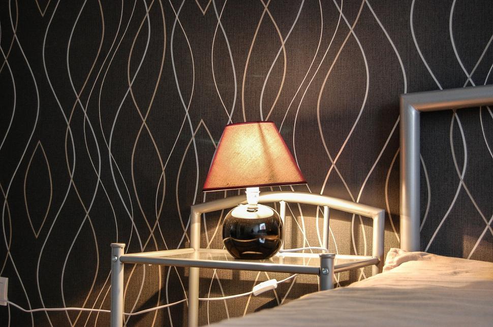 Free Image of Lamp on Nightstand Beside Bed 