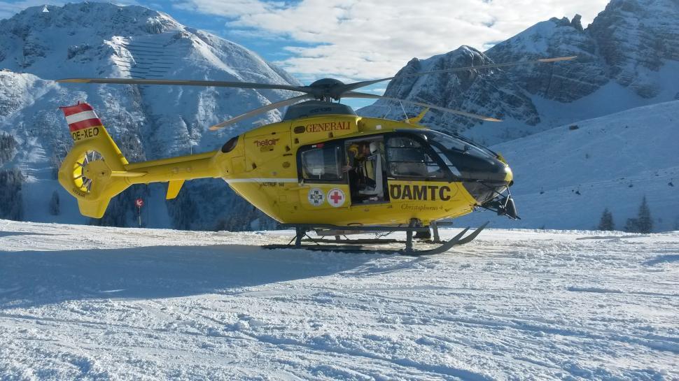 Free Image of Rescue helicopter on ski slope  