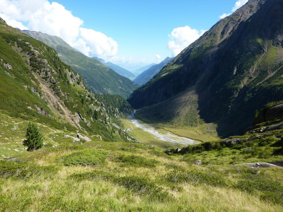 Free Image of Mountain valley with a river of blue glacier meltwater  