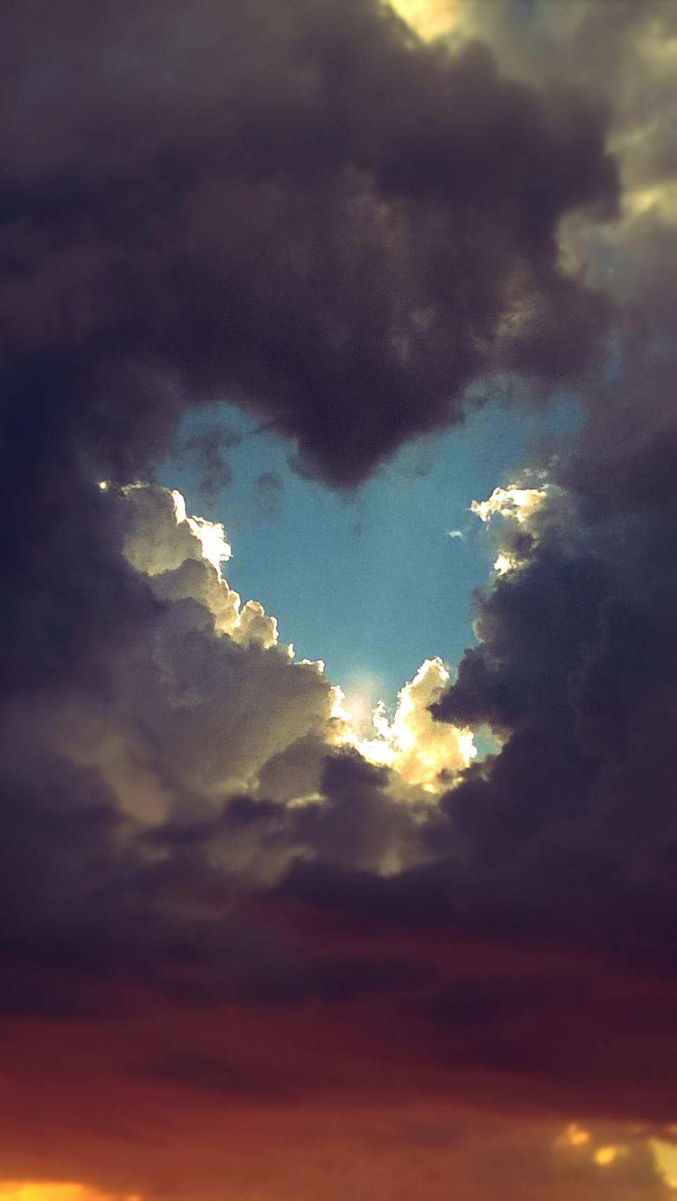 Free Image of Heart Shaped Break in the Clouds  