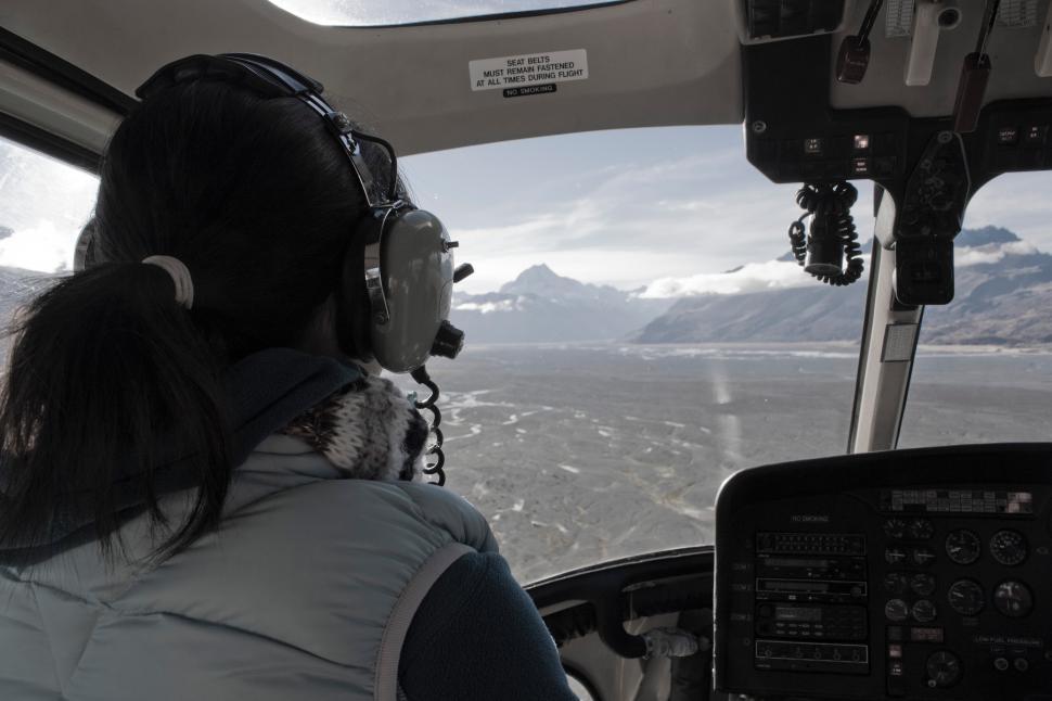 Free Image of Woman flying a helicopter 