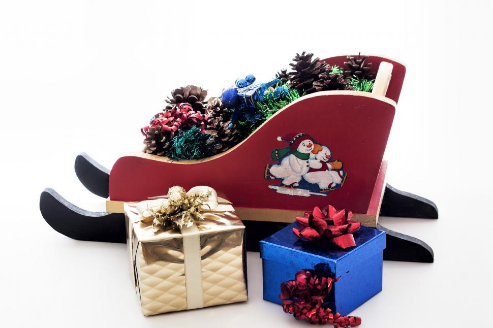 Free Image of Christmas sledge with blue and gold box 
