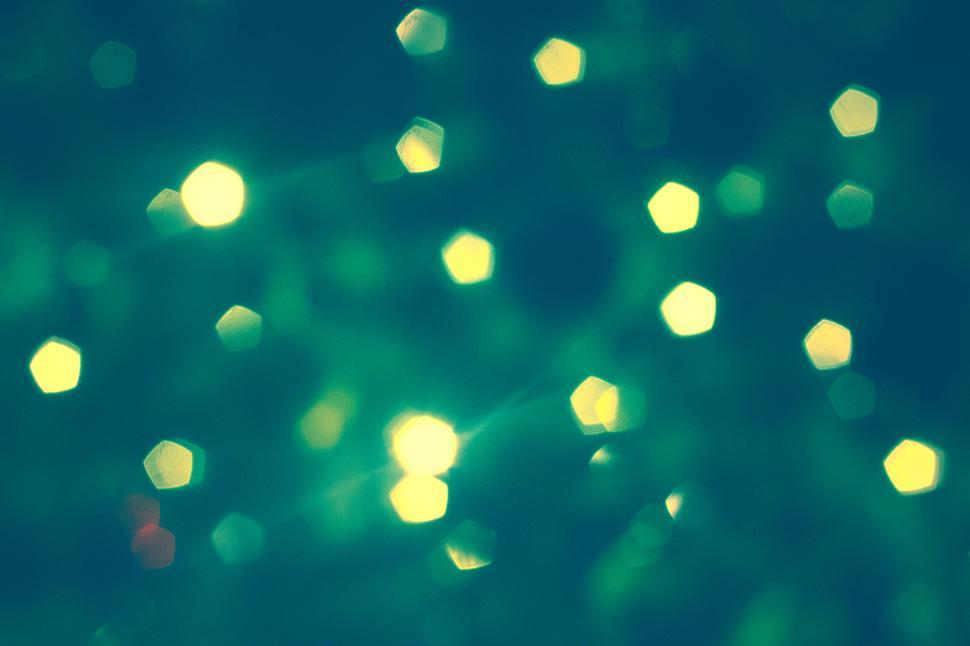 Free Image of Colorful background with yellow blurry lights  