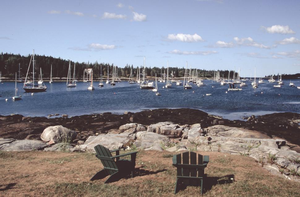 Free Image of Wooden beach chairs at a marila 