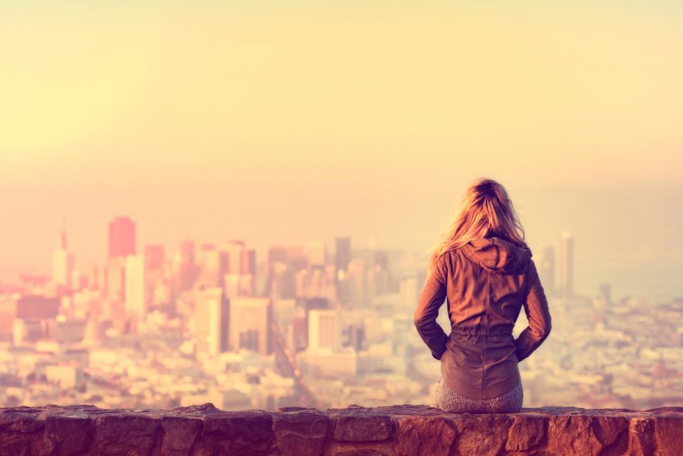 Free Image of Hazy Vintage Looks - Girl Looking Over the City 