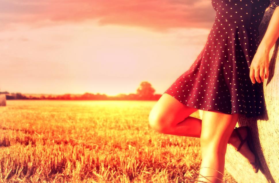 Free Image of Woman Posing on Haystack - Hazy Vintage Looks with Copyspace 
