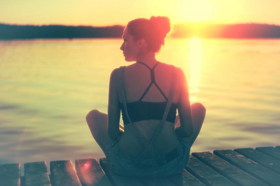 Free Image of Woman in the Pier - Relaxing at Sunset - Vintage Looks 