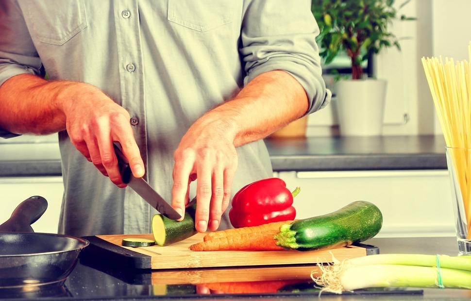 Free Image of Cooking - A Man Chopping Veggies 