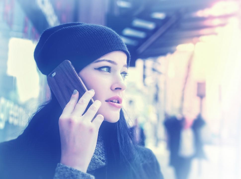 Free Image of Woman Talking Through Smartphone 