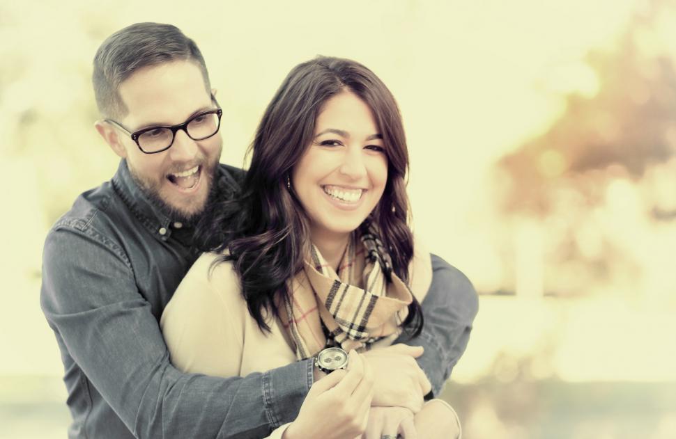 Free Image of Playful Couple Hugging  