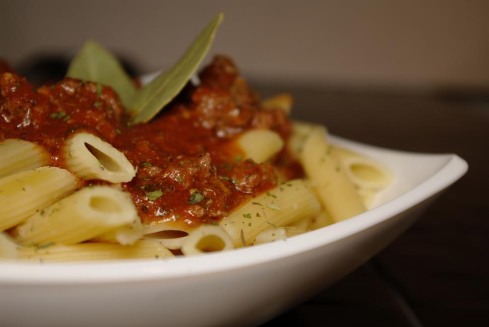 Free Image of White Bowl Filled With Pasta and Sauce 