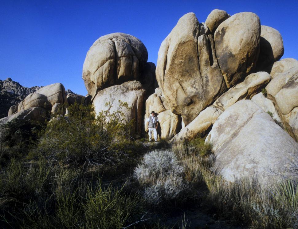 Free Image of Man and Rock Outcropping 