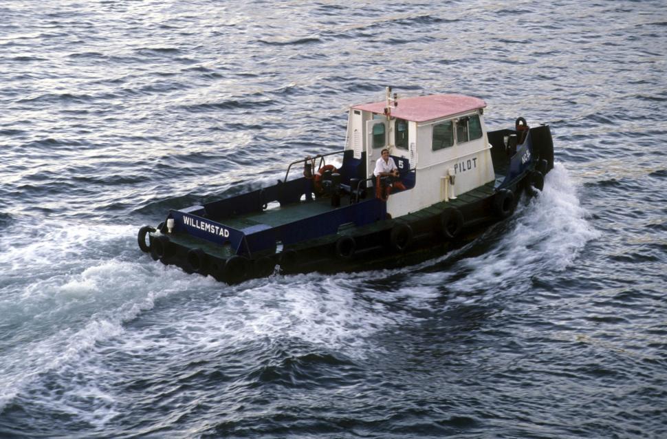 Free Image of Small boat with pilot at sea 