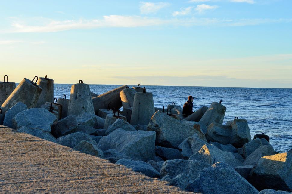 Free Image of Tetrapod (structure) and Man With Sea 