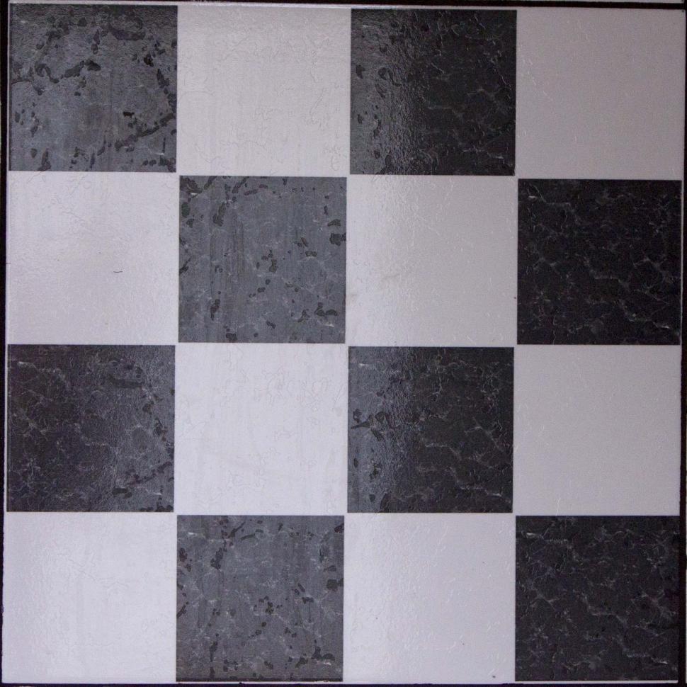 Free Image of Black and White Checkered Tile With Black Border 