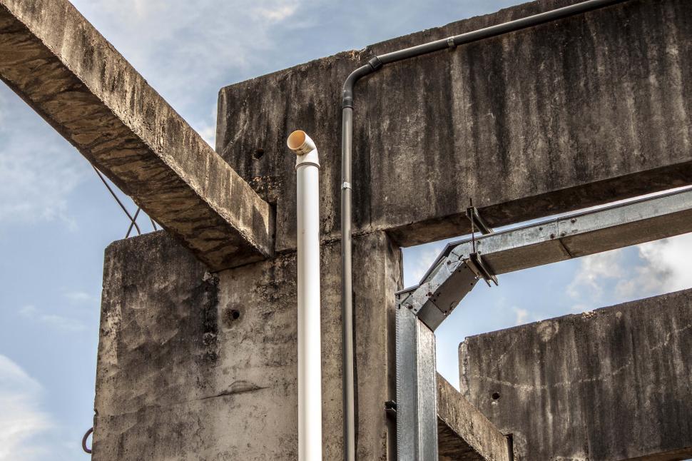 Free Image of Industrial exhaust and conduits on pillar 