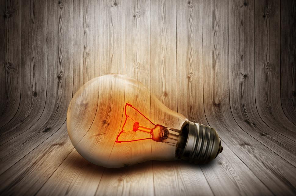 Free Image of Light Bulb With Orange Light Inside 