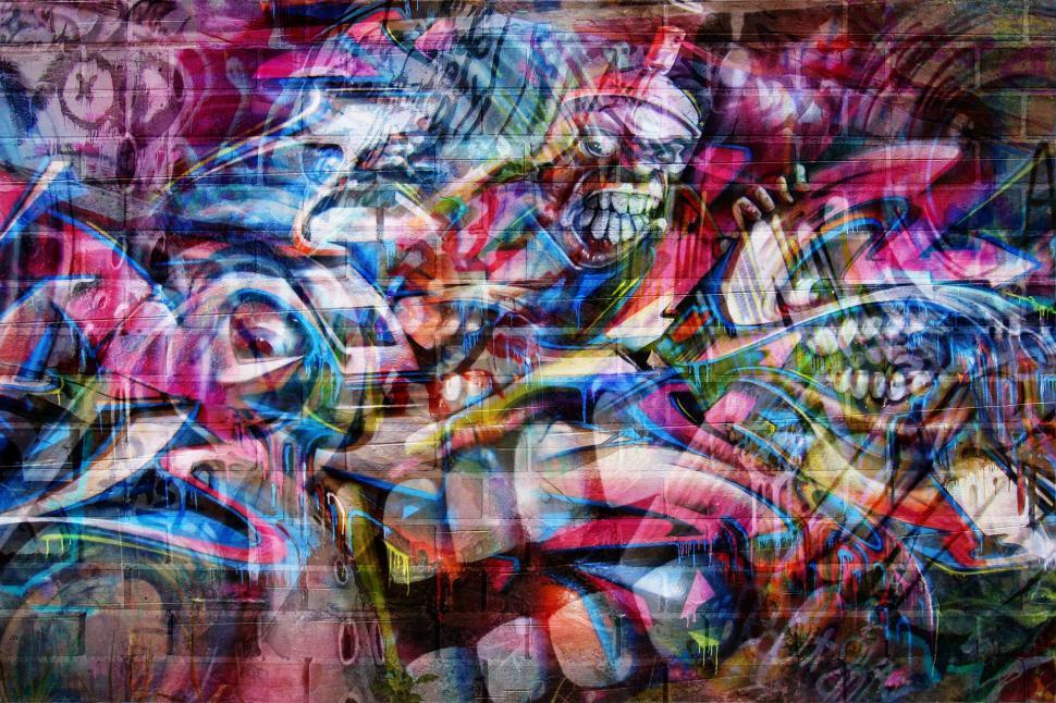 Free Image of Colorful Painting on Brick Wall 