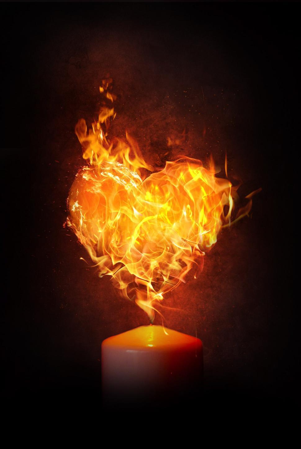 Free Image of Heart-Shaped Object on Table in the Dark 