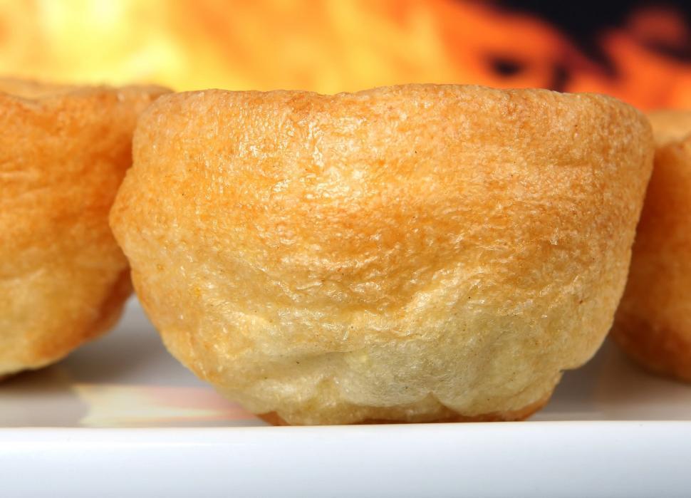 Free Image of Close Up of Three Doughnuts on a Plate 