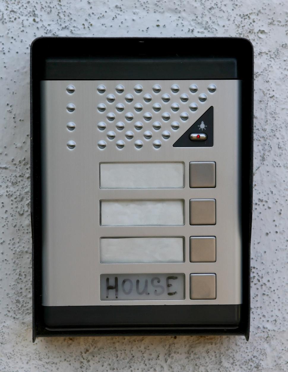 Free Image of House Button on Wall 