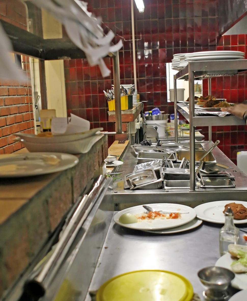 Free Image of Abundance of Food Plates in Busy Kitchen 