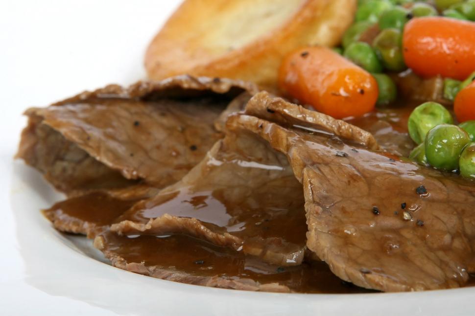 Free Image of White Plate Topped With Meat and Vegetables 