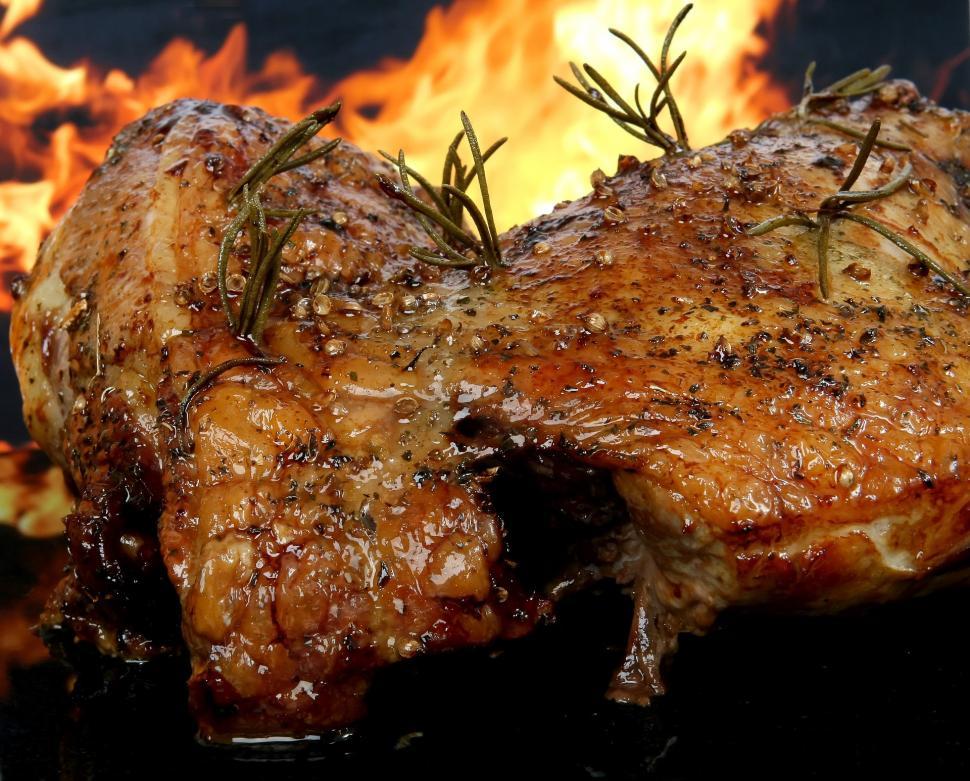 Free Image of Large Piece of Meat Grilling on BBQ 