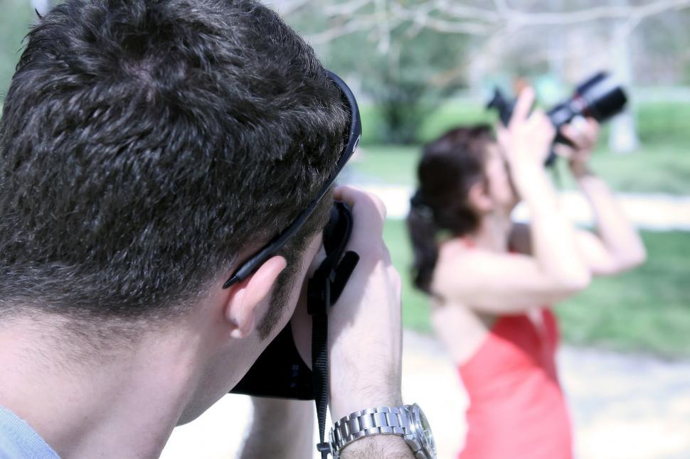 Free Image of People Holding Up Cell Phones 