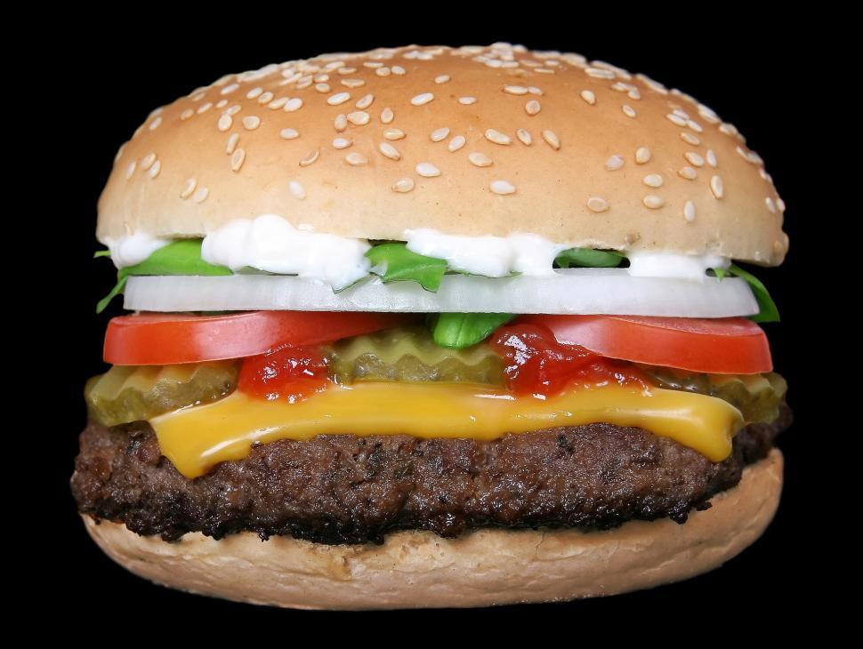 Free Image of Delicious Hamburger With Cheese, Tomato, Lettuce, and Ketchup 