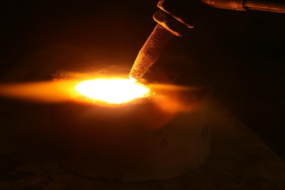 Free Image of Person Holding a Lit Object 