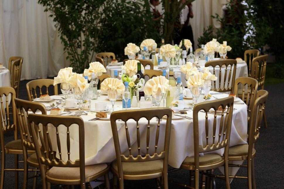 Free Image of A Table Surrounded by Chairs 